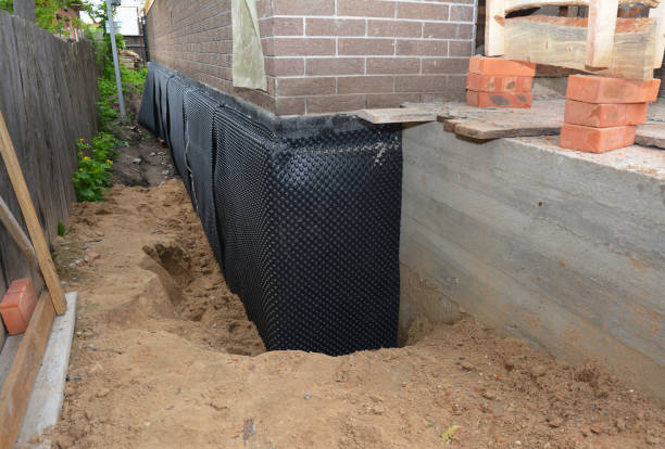 SJ Waterproofing Pros technician performing targeted Sump Pump Installation assessment in Harriman, TN